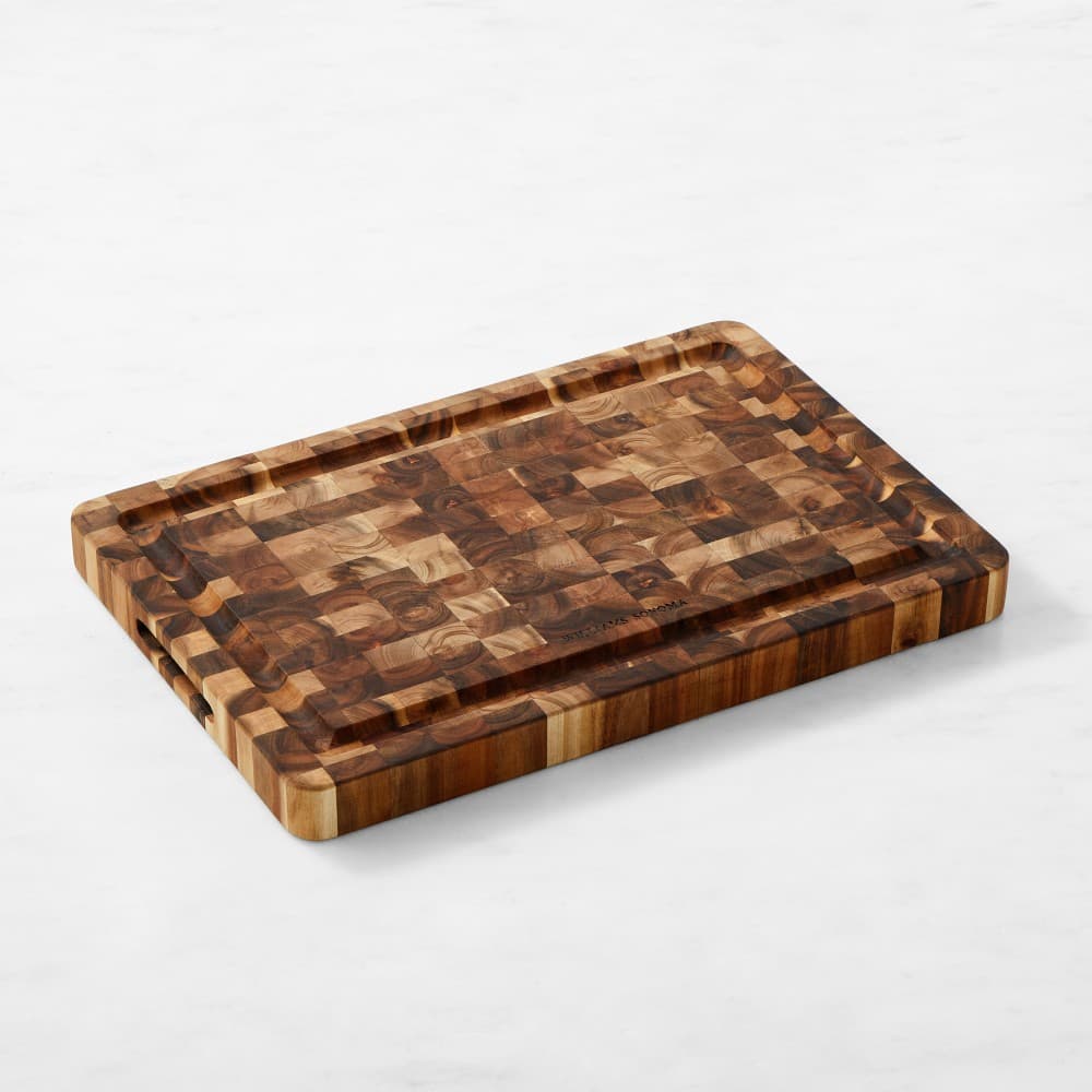 Acacia end-grain board with a perimeter juice groove